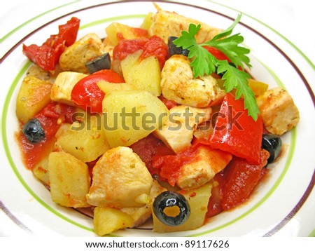 cooked chicken meat with tomato potato and pepper
