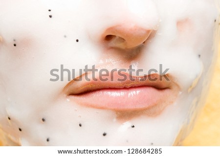 Close up of a woman with beauty mask on her face