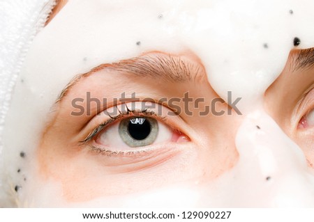 Closeup of a woman with beauty mask on her face