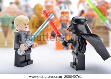 Ankara, Turkey - April 06, 2013: Lego Star Wars Darth Vader and Luke Skywalker are fighting with sword in front of Star Wars characters