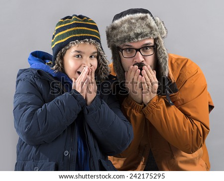 Father and Son Shiver with Cold