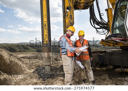 Engineer Shows Construction Worker