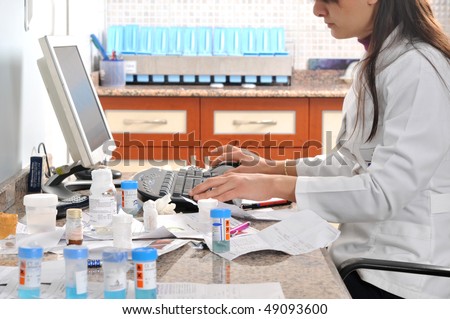 A laboratory assistant working at pathology. A series of laboratory related pictures.