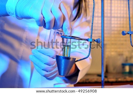 A medical assistant working on traditional measure equipment at pathology lab. A series of laboratory related pictures.
