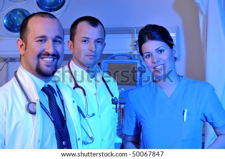 Medical doctors and a nurse at hospital emergency room intensive care - a series of emergency room photos.