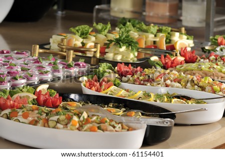 Buffet style food in trays - a series of RESTAURANT images.