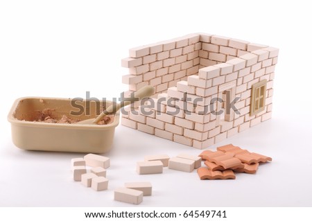 Building a brick house isolated on white - a series of BUILDING A HOUSE images.