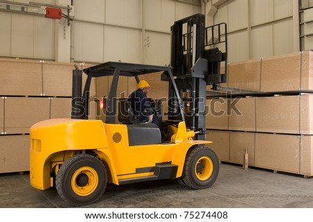 Forklift operator working at warehouse - a series of METAL INDUSTRY images.