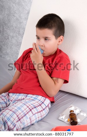 Cute boy with respiratory problem or asthma.