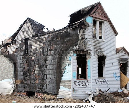 DETROIT, MI-MAY, 2015:  Abandoned and fire damaged single family home near downtown Detroit.