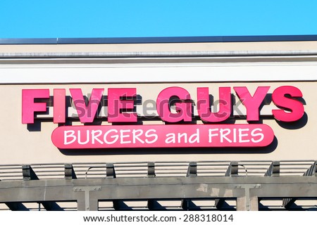 NASHVILLE, TN-JUNE, 2015:  Five Guys Burgers and Fries restaurant exterior. Five Guys is a restaurant chain that serves on hamburgers, hot dogs, and French fries
