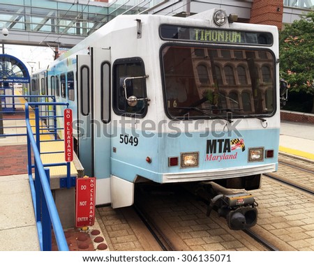 BALTIMORE, MD-AUGUST, 2015:  The city of Baltimore is well served with mass transit including this street car line running near Baltimore's Oriole Stadium at Camden Yard and the Convention Center.
