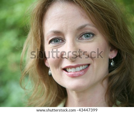 Head shot of a middle aged woman
