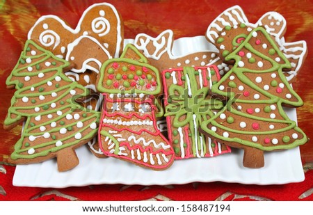 Christmas gingerbread cookies shapes: trees, present and stocking