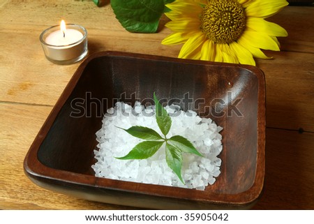 Spa resort therapy composition, candle, sunflower and salt crystals