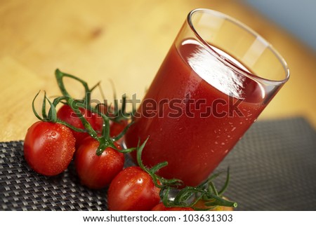 Fresh tomato juice garnished with fresh cherry tomatoes