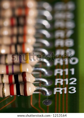 Some labeled resistors on a integrated circuit board.