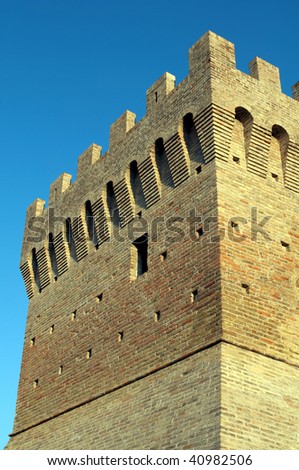 Castle tower isolated on the blue sky