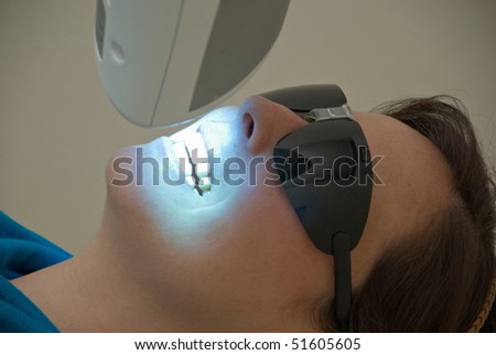 Woman getting her teeth whitened