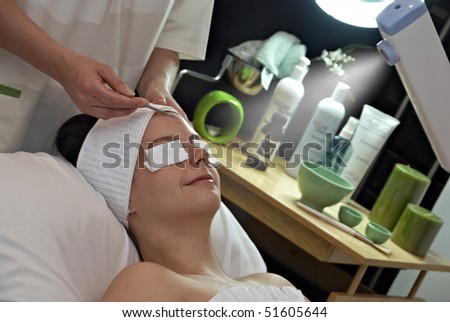 woman getting steam on her face in spa