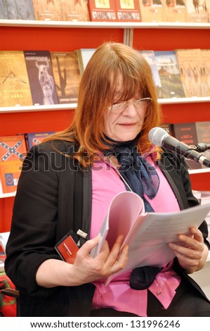 LEIPZIG, GERMANY - MARCH 14: Author presenting her book at Leipzig Book fair on March 14, 2013 in Leipzig, Germany. Leipzig Book Fair is the most important spring event for the publishing houses.