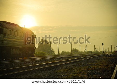 Morning Train Station: Rising Sun is Above the Train