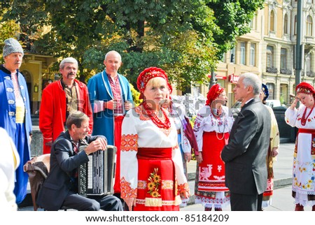 LVIV, UKRAINE - SEPTEMBER 15: Unidentified Ukrainian choir members dressed in national clothes sing Ukrainian national songs at the annual Lviv Book Forum on September 15, 2011 in Lviv, Ukraine
