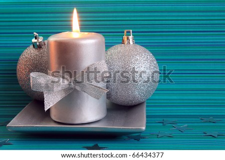Christmas candle and two silver balls