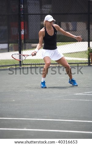 RALEIGH - MAY 13: Monique Adamczak, Women\'s Pro-circuit tennis player, competes in the RBC Women\'s Pro-Circuit tennis tournament at the North Hill\'s Club on May 13, 2009 in Raleigh, N.C.