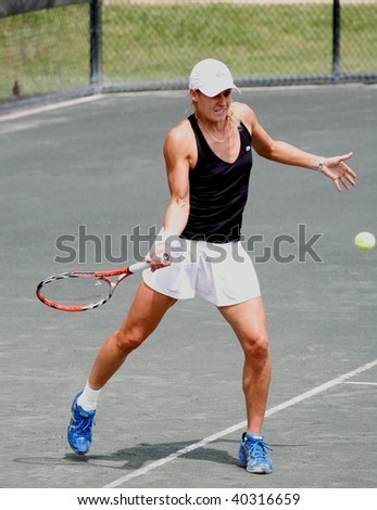 RALEIGH - MAY 13: Monique Adamczak, Women\'s Pro-circuit tennis player, competes in the RBC Women\'s Pro-Circuit tennis tournament at the North Hill\'s Club on May 13, 2009 in Raleigh, N.C.