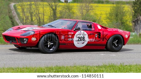 MUTSCHELLEN, SWITZERLAND-APRIL 29: Vintage race touring car Ford GT 40  from 1969 at Grand Prix in Mutschellen, SUI on April 29, 2012.  Invited were vintage sports cars and motorbikes.
