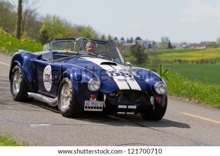 MUTSCHELLEN, SWITZERLAND-APRIL 29: Vintage race touring car AC Cobra 427 SC Contemporary from 1965 at Grand Prix in Mutschellen, SUI on April 29, 2012.  Invited are vintage sports cars and motorbikes.