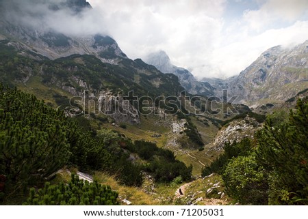 Twisting hiking trail in rough, rocky, back country of UNESCO world heritage National Park Durmitor, Montenegro