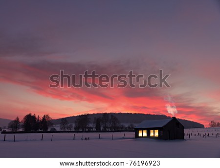 Little House With Decorated Windows Lighted In Front Of A Winter ...