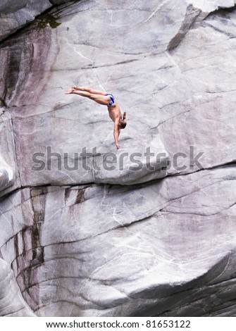 LOCARNO - JULY 23: Cliff diving athlete  Oleg Vyhsyvanov compete in the WHDF European Championship 2011 with dives from up to 20m high at Ponte Brolla, .July 23, 2011 in Locarno, Switzerland.