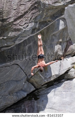 LOCARNO - JULY 23: Cliff diving athlete Christian Wurst competes in the WHDF European Championship 2011 with dives from up to 20m high at Ponte Brolla July 23, 2011 in Locarno, Switzerland.