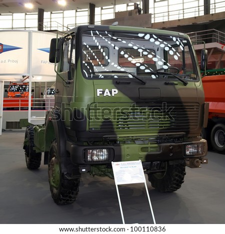 BELGRADE - MARCH 29: An FAP army truck on display at the 50th International Car Show on March 29, 2012 in Belgrade, Serbia. Stitched Panorama of FAP military truck.