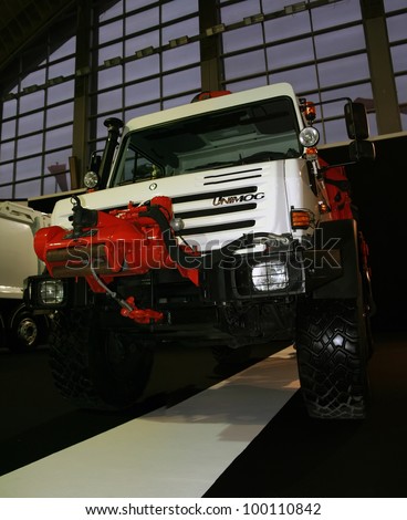 BELGRADE - MARCH 29: An Unimog truck on display at the 50th International Car Show on March 29, 2012 in Belgrade, Serbia. Stitched Panorama of Unimog truck.