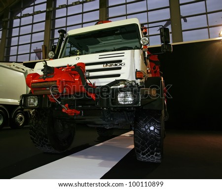 BELGRADE - MARCH 29: An Unimog truck on display at the 50th International Car Show on March 29, 2012 in Belgrade, Serbia. Stitched Panorama of Unimog truck.