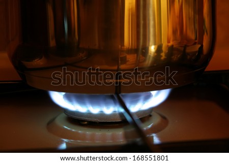 Gas stove. Blue propane flame.