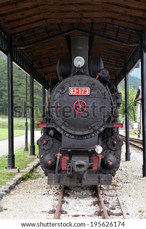 Old steam train locomotive. Big steam locomotive.