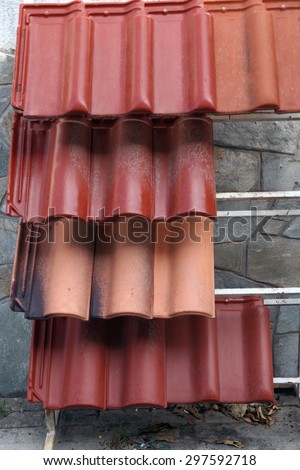 Roof tiles. Exhibited roof tiles in front of hardware store.