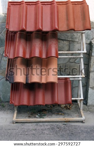 Roof tiles. Exhibited roof tiles in front of hardware store.