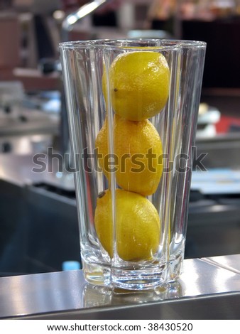 lemons in the glass on the bar. lemons in the glass.