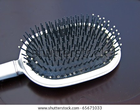 Hair brush. Big plastic hair brush.