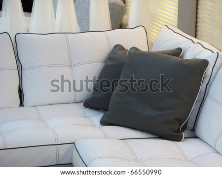 Living room furniture. Leather furniture. Leather couch with pillows.