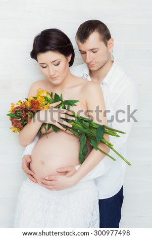 Portrait of husband and pregnant wife