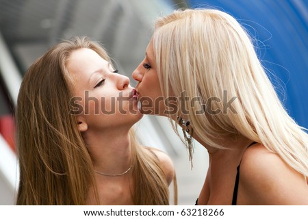 Two girls kissing