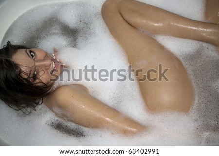 Naughty girl takes a bath