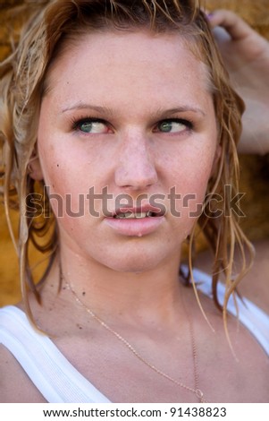 portrait of girl with red hair wet